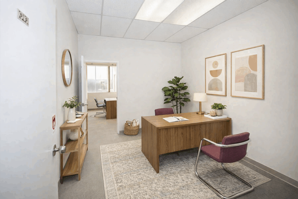 Modern office environment with clean design, contemporary furniture, and a professional atmosphere.